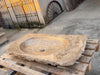 Lavabo de piedra travertino amarillo.